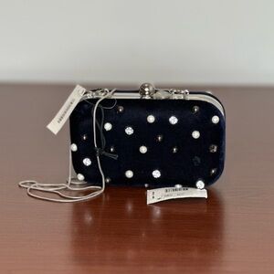 Black Clutch with Sleek Design and Wristlet